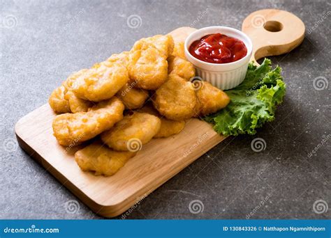 Chicken nuggets with sauce stock photo. Image of nugget - 130843326