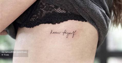 Lettering tattoo that says "know thyself" located on