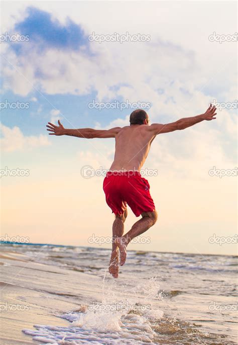 Happy man jumping — Stock Photo © yeti88 #34769895