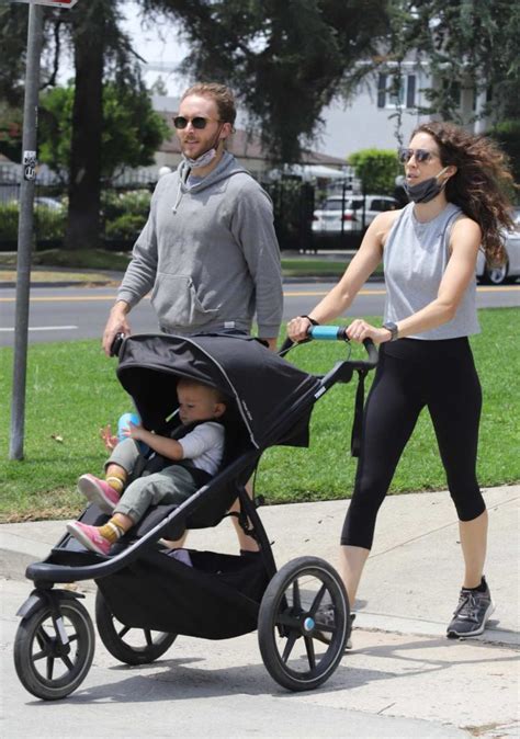 Troian Bellisario in a Gray Top Walks Out with Patrick J. Adams and ...