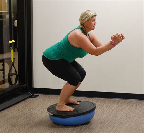 Try This: How to do a BOSU® Ball Squat - ABC Fit Studio