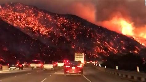 Video shows fire raging near freeway - Video - Business News