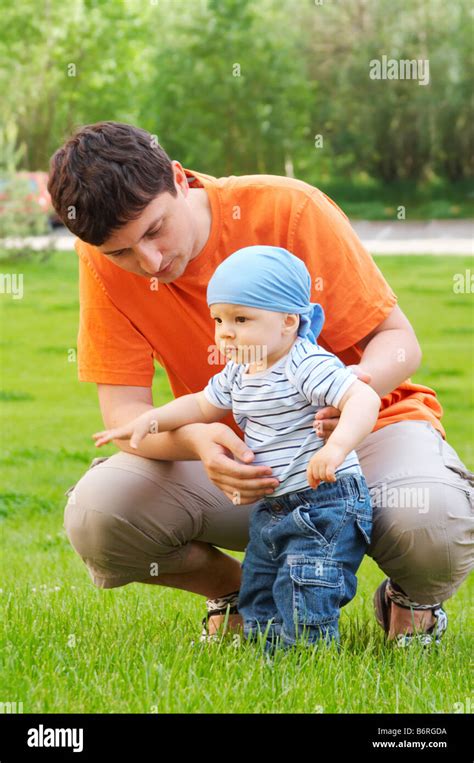 baby first steps Stock Photo - Alamy