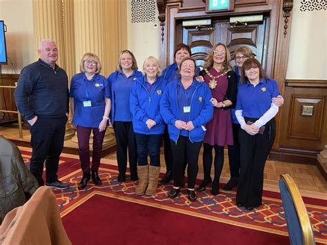 West Belfast volunteers among those celebrated at City Hall