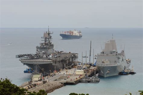 U.S. Navy ships are docked at White Beach Naval Facility, Okinawa. | Okinawa, Navy ships, Naval