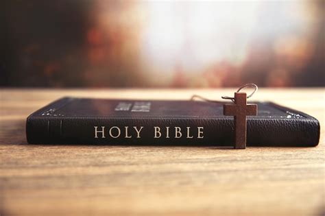 Premium Photo | Holy bible with wooden cross