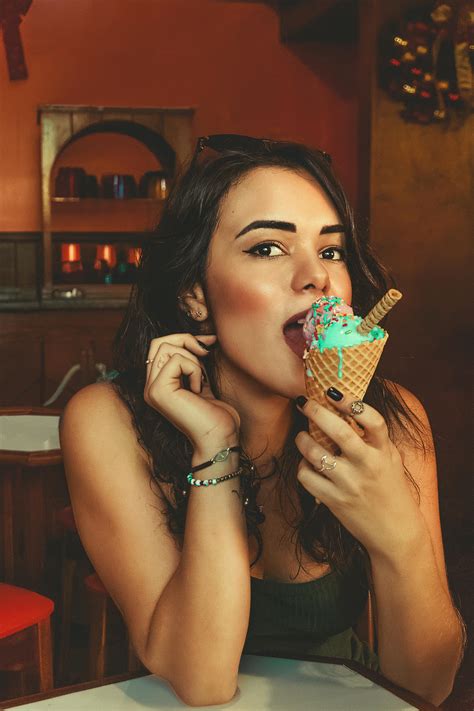 Photo Of Woman Eating Ice Cream · Free Stock Photo