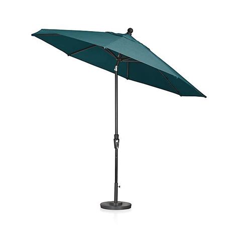 Shop 9' Round Sunbrella ® Bold Turquoise Patio Umbrella with Tilt Black Frame. With a Bold ...