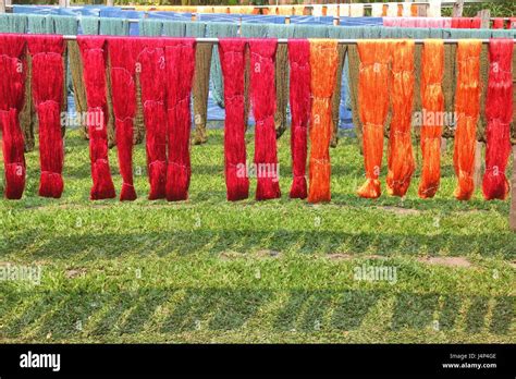 56574808 - the colorful weaving loom and the silk Stock Photo - Alamy