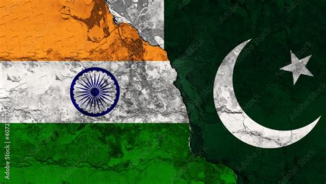 Concept of a Conflict between India and Pakistan with painted flags on ...