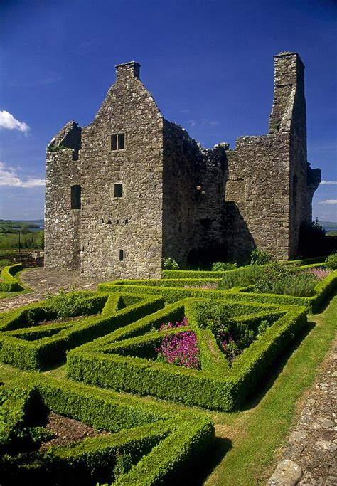 A Garden In Front Of Tully Castle Near Photograph by The Irish Image Collection - Fine Art America