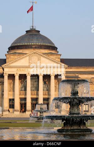 spa house and Casino with fountain in Wiesbaden in evening light, Germany, Hesse, Wiesbaden ...