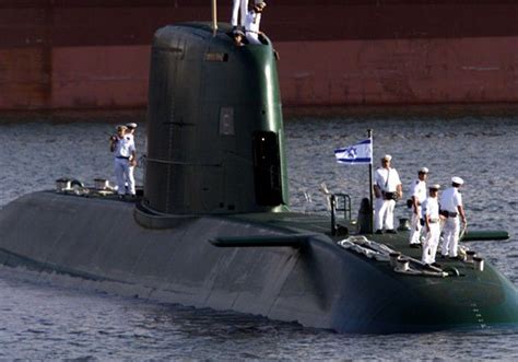 A Dolphin-class submarine enters Haifa port. Photo By: REUTERS | Submarines, Submarine, Arms race