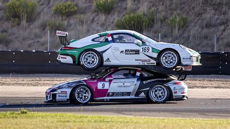 Porsche 911 GT3 racecar ends on top of another 911 GT3 at Carrera Cup France race [video]