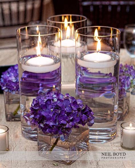 Purple hydrangea flowers and candles for wedding reception centerpiece. | Hydrangeas wedding ...