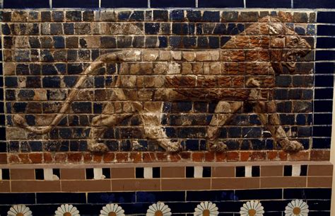 A panel composed of glazed nicks showing in bas relief a lion ...