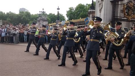 a group of men in uniform playing musical instruments