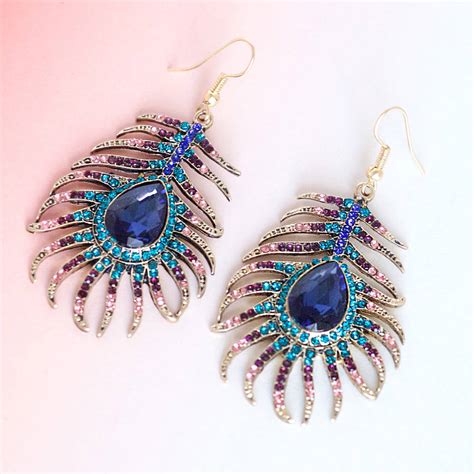 peacock feather earrings by junk jewels | notonthehighstreet.com