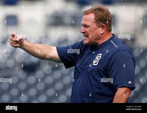 San Diego Padres interim manager Pat Murphy directs his infielders during practice prior to a ...