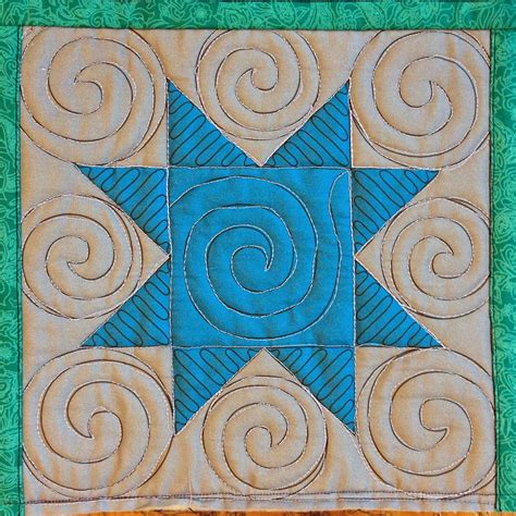 The Free Motion Quilting Project: 48. Quilt Spirals in a Sawtooth Star