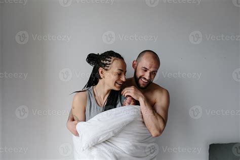 man and woman in the bedroom 11369162 Stock Photo at Vecteezy