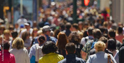 Crowd of people walking busy street in New York City Stock Photo | Adobe Stock