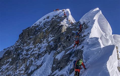 More than 170 climbers summit Everest in a day