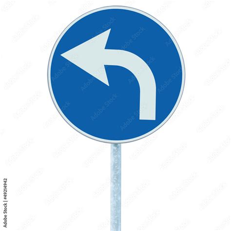 Turn left ahead sign blue isolated roadside traffic signage Stock Photo ...