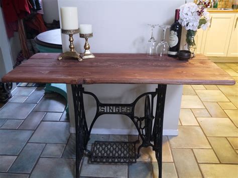 Singer treadle table made with reclaimed wood... such a grand statement! | Antique sewing table ...