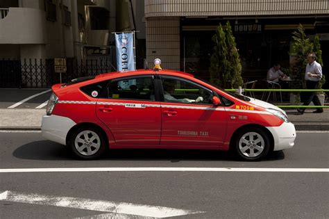 Daytime landscape view of a Toyota Prius Hybrid taxi cab n… | Flickr