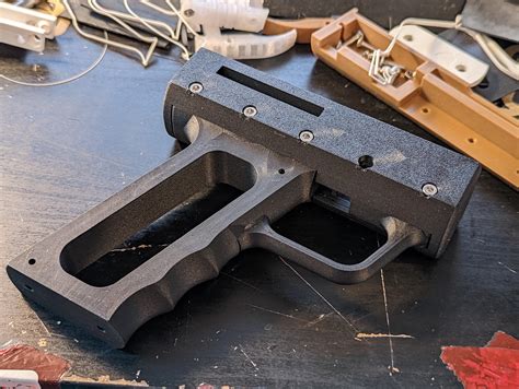 This 3D-printed pistol grip camera trigger gives new meaning to a point and shoot camera ...