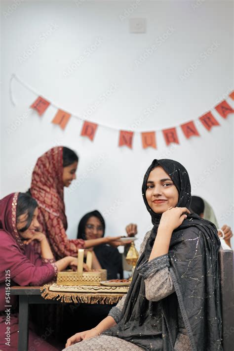 Happy Muslim family celebrating Eid Mubarak Stock Photo | Adobe Stock