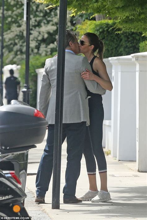 Hugh Grant, 61, kisses his gym gear-clad wife Anna Eberstein, 42 | Daily Mail Online