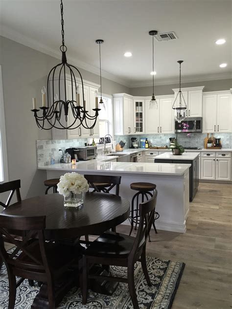 Black Chandelier Over Kitchen Table - pic-corn