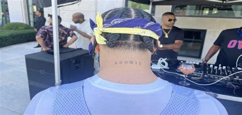 Drake gets neck tattoo of name of his son Adonis