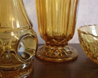 3 Piece Set of Amber Glassware - Two Vases and Bowl