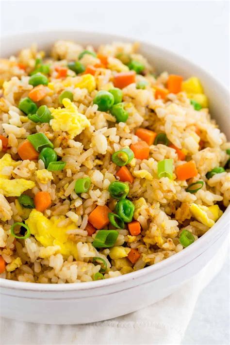 Chinese fried rice recipe made with fragrant jasmine rice, carrots, peas, and scrambled eggs ...