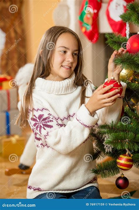 Happy Girl Decorating Christmas Tree at Living Room Stock Image - Image of home, beautiful: 76917159