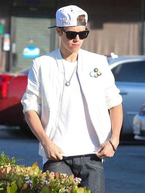 Justin Bieber Picture 852 - Justin Bieber Wears A White Jacket and Matching Baseball Cap While ...