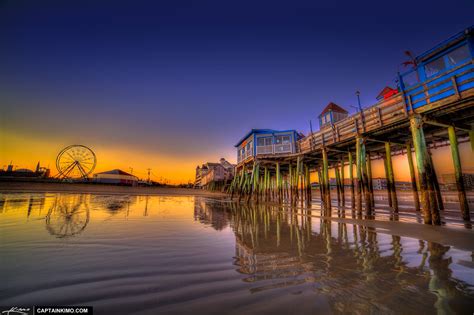 Sunset at Old Orchard Beach Pier next to Ferris Wheel