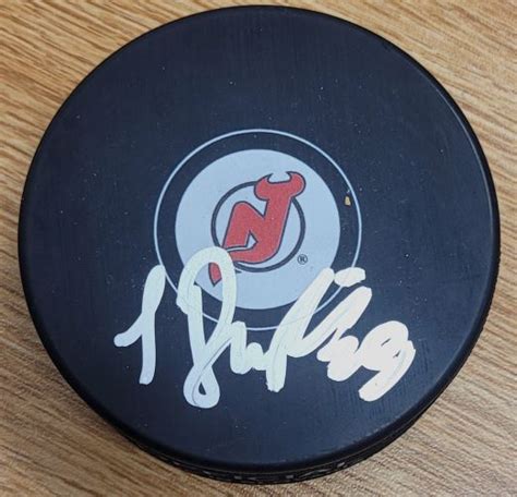 AUTOGRAPHED SERGEI BRYLIN New Jersey Devils Hockey Puck - Main Line Autographs