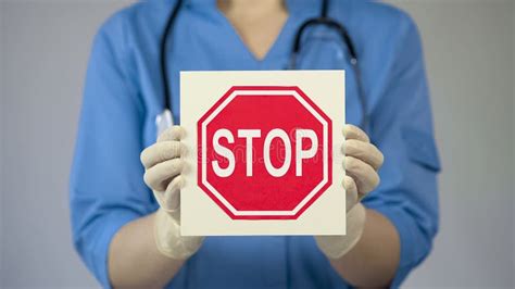 Doctor Holding Stop Sign, Warning about Unhealthy Lifestyle, Harmful Habits Stock Photo - Image ...