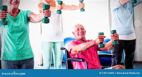 Portrait of Seniors Exercising with Weights Stock Image - Image of ...