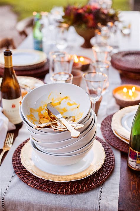 "Pile Of Stacked Dishes After Dinner" by Stocksy Contributor "Matthew ...