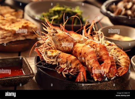 Udang Galah Goreng. Pan-fried giant freshwater prawns; served among ...