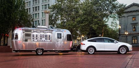 Tesla uses a classic road trip icon, the Airstream, to show off its ...