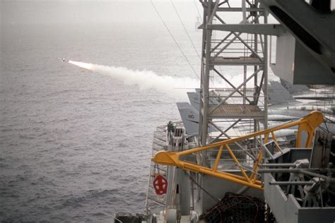 An RIM-7 Sea Sparrow missile is fired from the aircraft carrier USS KITTY HAWK (CV-63) during a ...