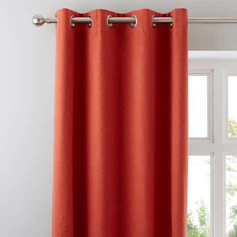 Luna Burnt Orange Blackout Eyelet Curtains | Dunelm