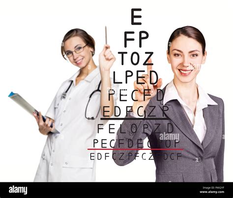 Doctor recording the results an eyesight test Stock Photo - Alamy