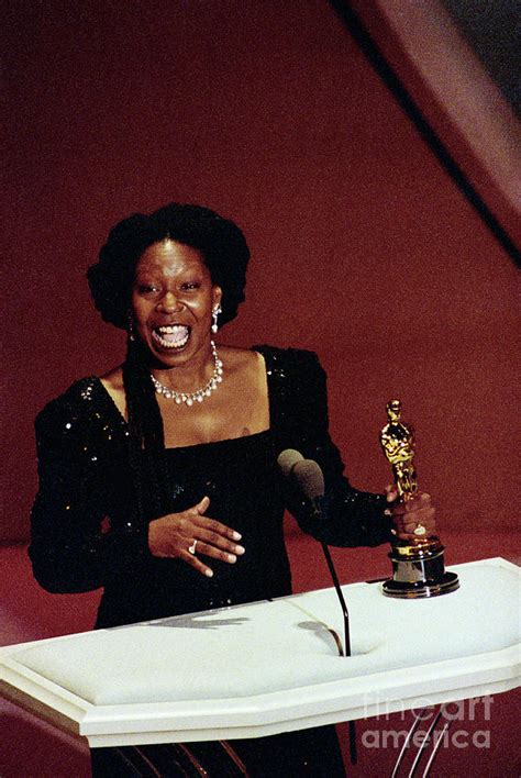 Whoopi Goldberg Holding Oscar by Bettmann